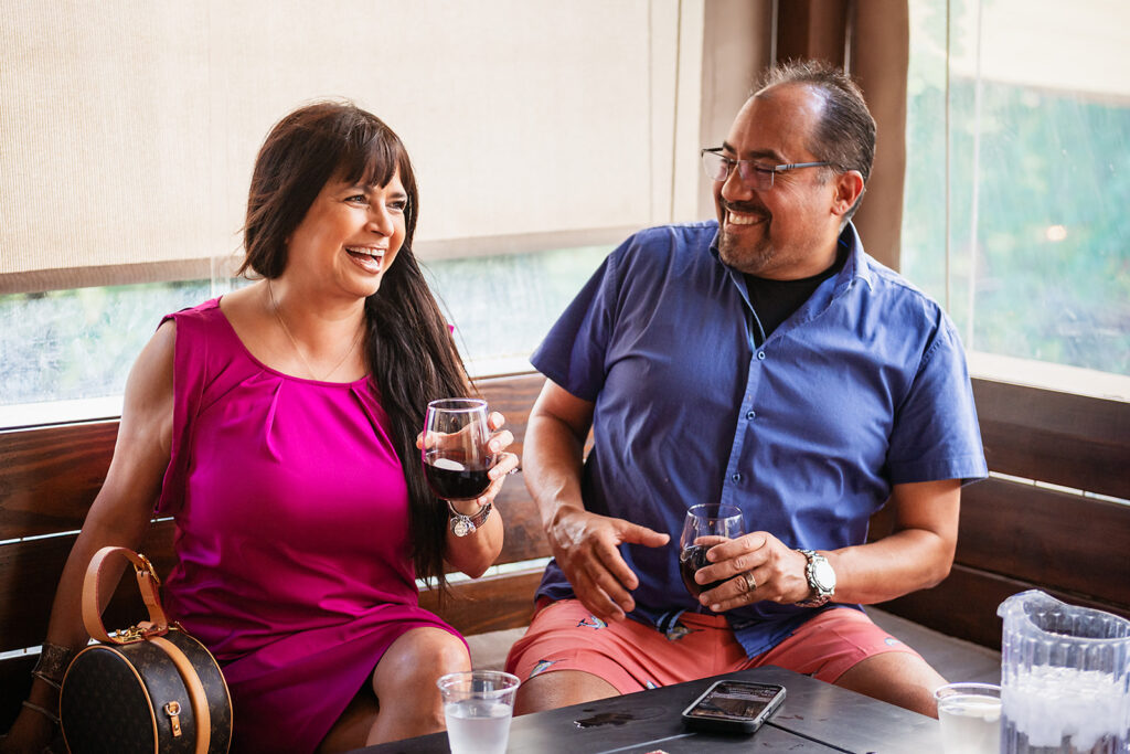 Guests enjoying wine together at In Contrada Vineyard